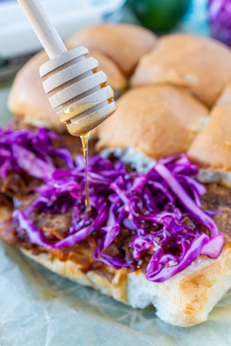 Adding a drizzle of honey to red cabbage slaw