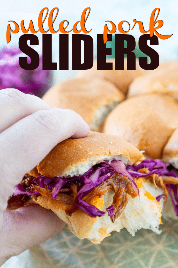 Easy oven baked Hawaiian BBQ pulled pork sliders with slaw made from red cabbage! The perfect party dish for a crowd!