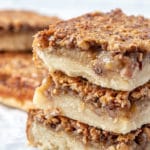 Stacked pecan pie bars with shortbread crust