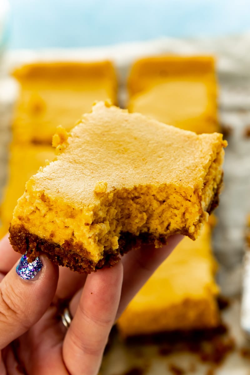 bit pumpkin cheesecake bars with a graham cracker crust