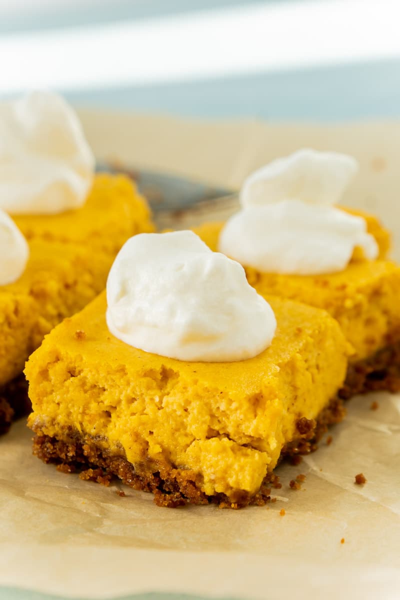 Easy pumpkin cheesecake bars with a graham cracker crust