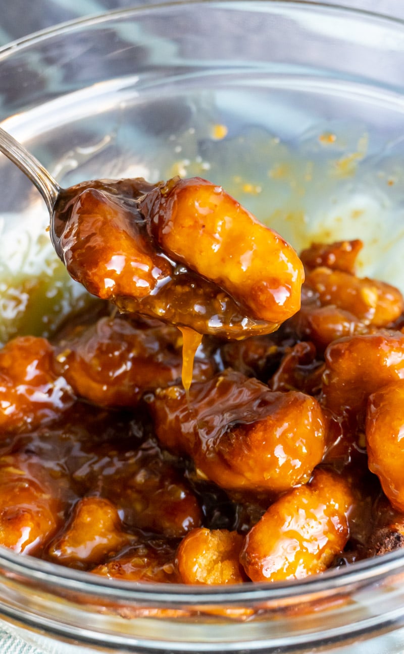 Tossing chicken in an easy orange chicken recipe