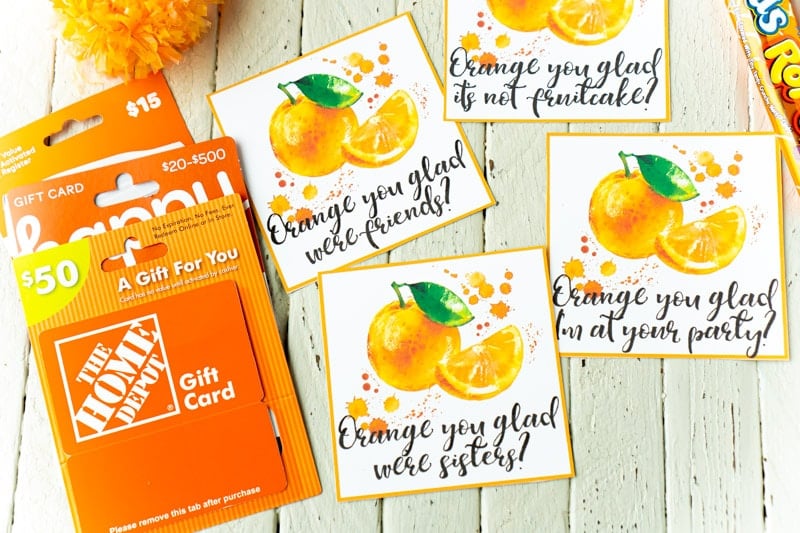 Orange gift tags with a Home Depot gift card