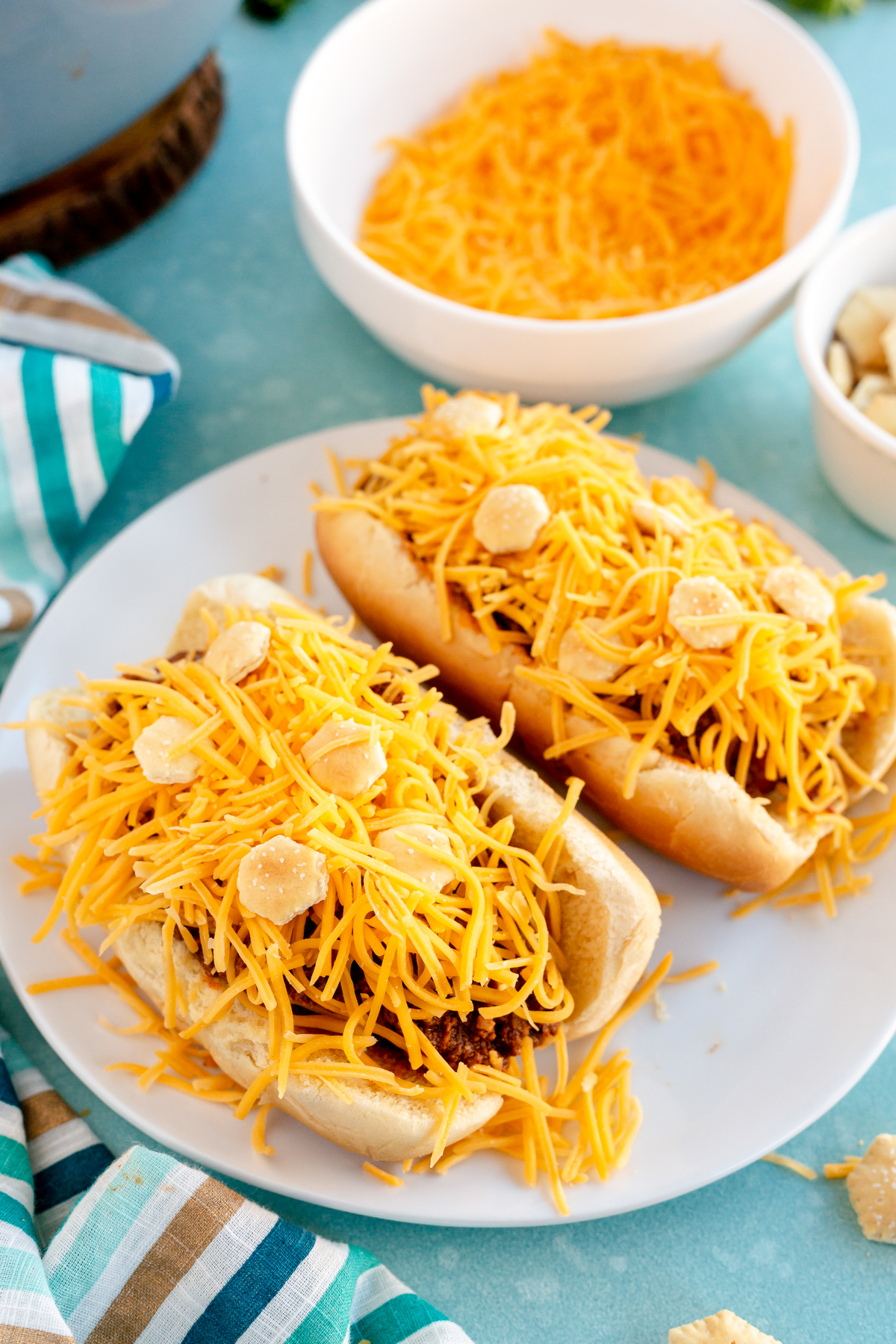 cheese coneys with Cincinnati chili on top