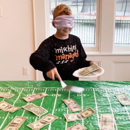 Kid playing a super bowl party game