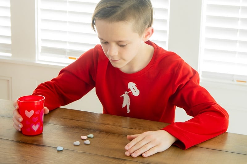 playing a game with hearts and cups