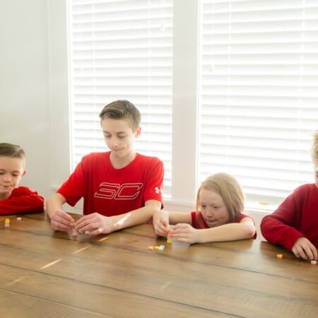 The best minute to win it Valentine's Day games for any age! Great for kids, for adults, for couples, for teens, and even for seniors! Play in the classroom, for school parties, or at home!