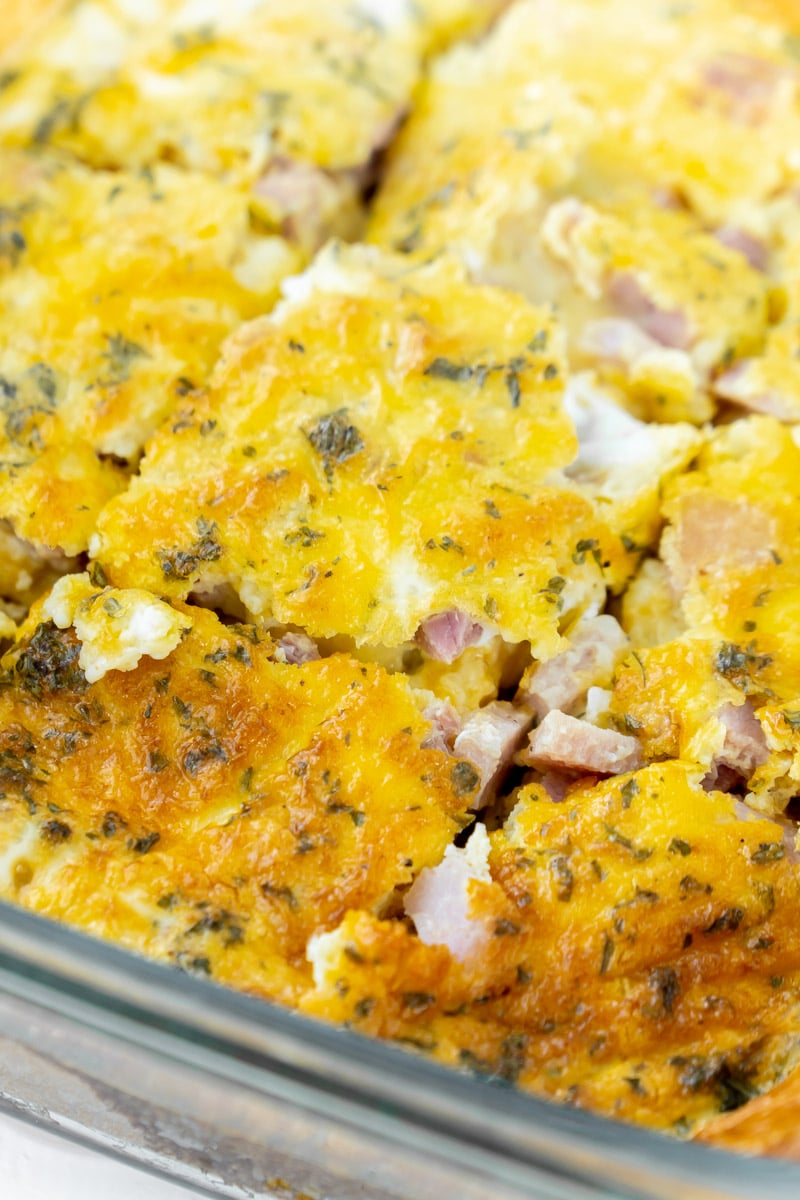 Sliced up ham and cheese breakfast casserole