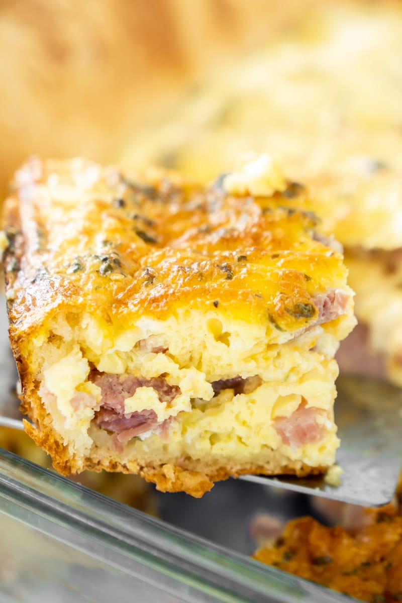 Piece of ham and cheese breakfast casserole