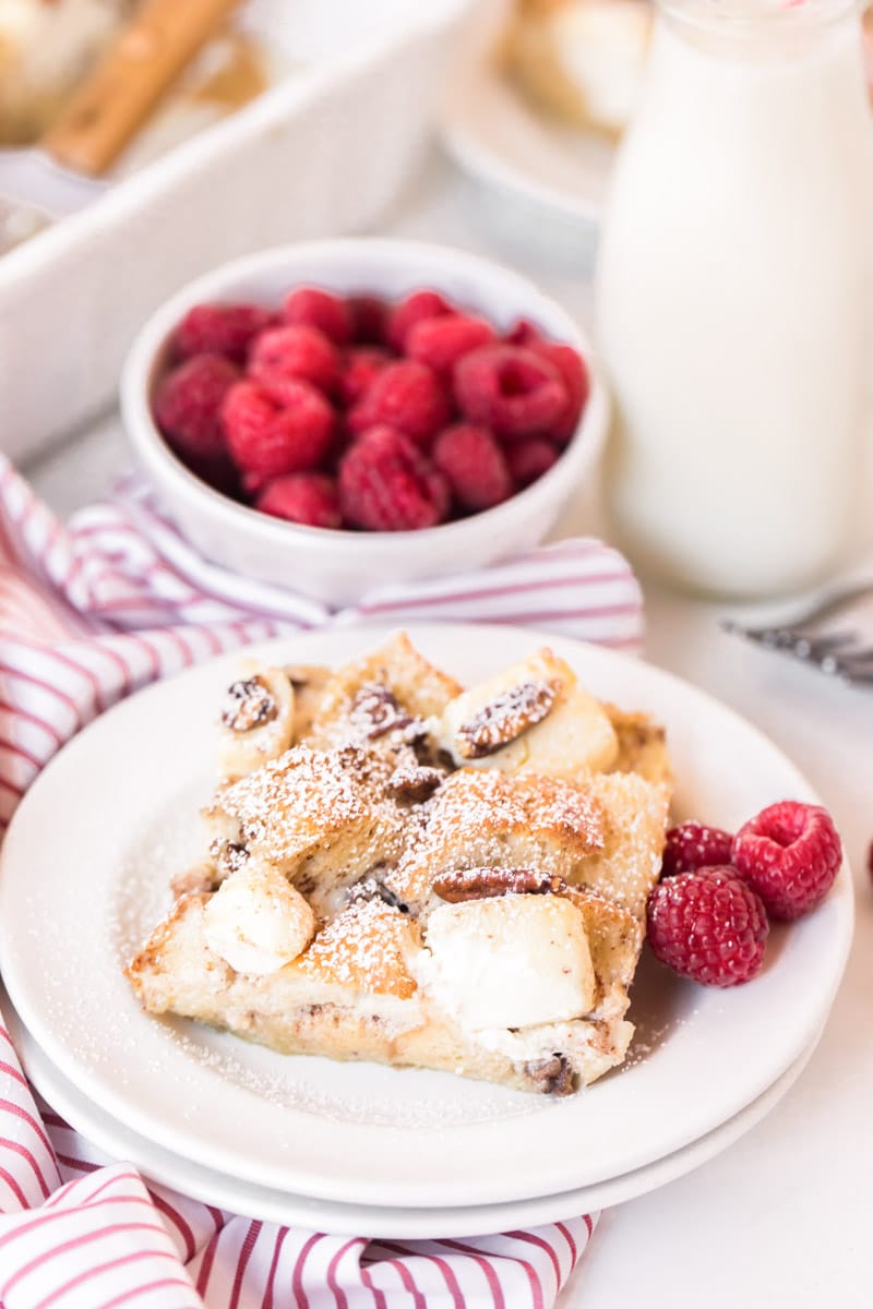 Cut piece of french toast casserole with cream cheese