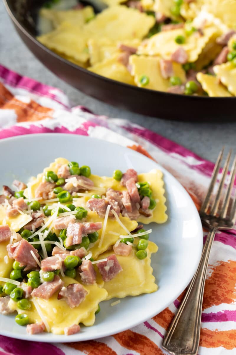 Plate of ravioli with creamy garlic butter sauce