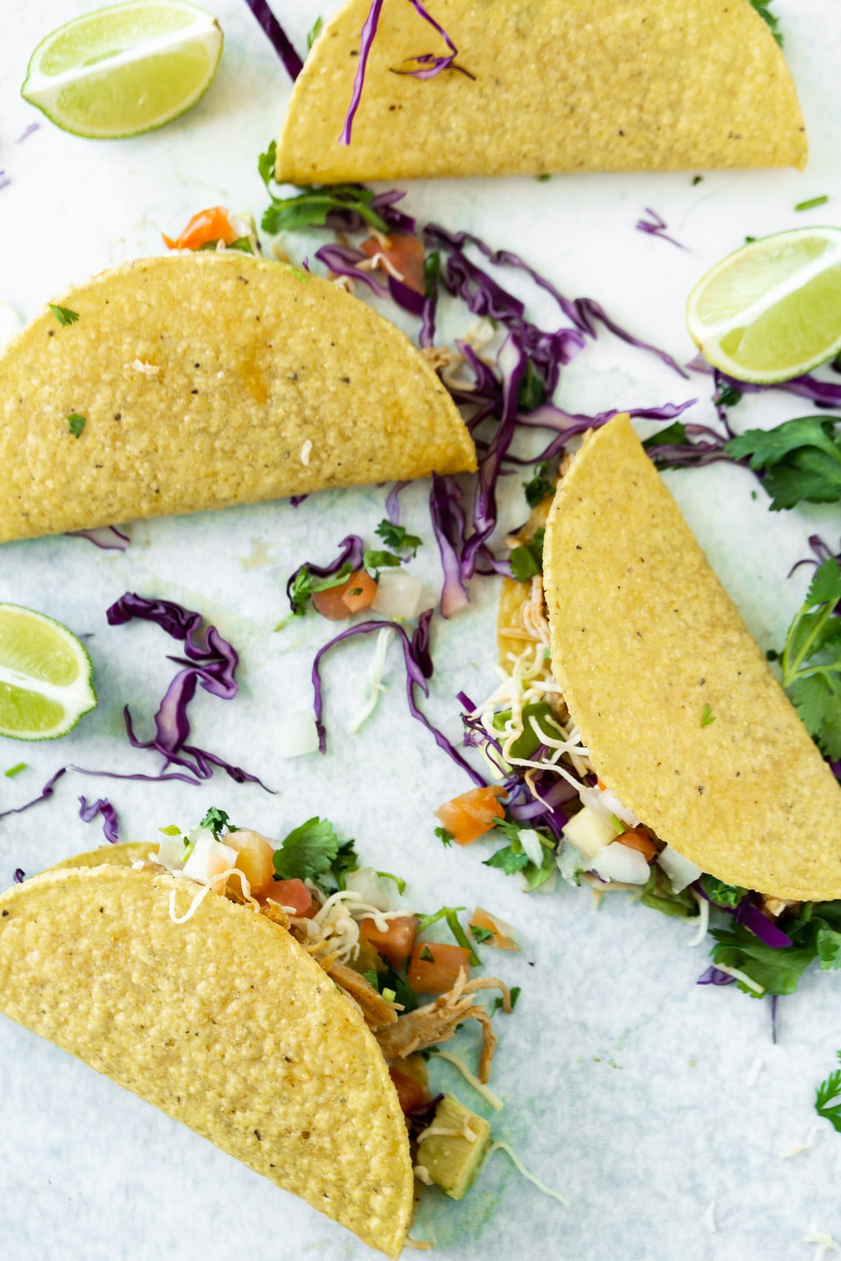 Top view of four Instant Pot chicken tacos