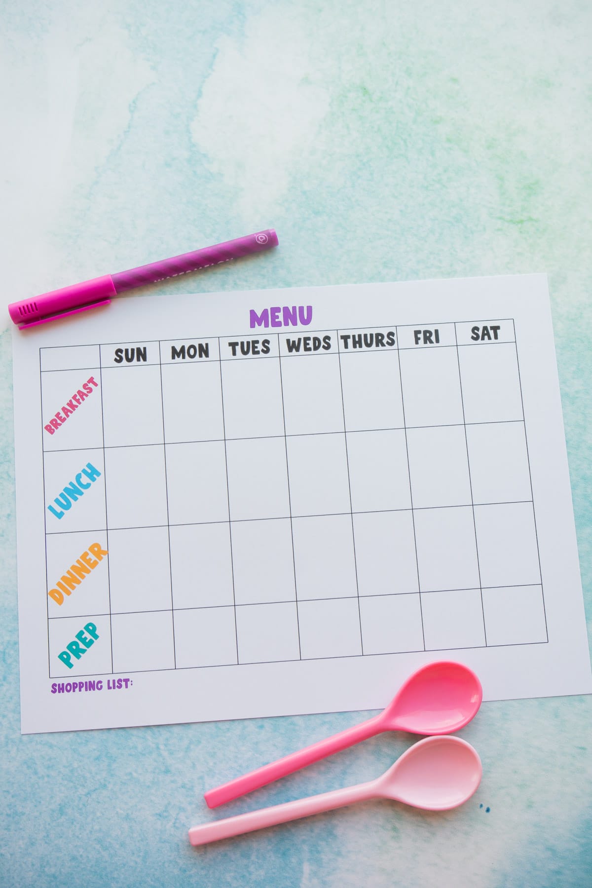 Pens, spoons, and a weekly meal planner