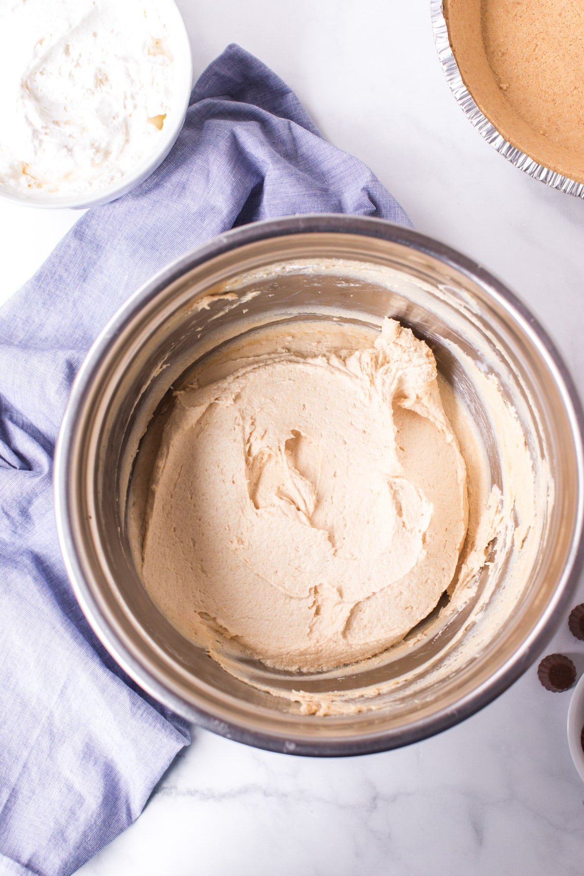 Peanut butter pie filling in a metal bowl