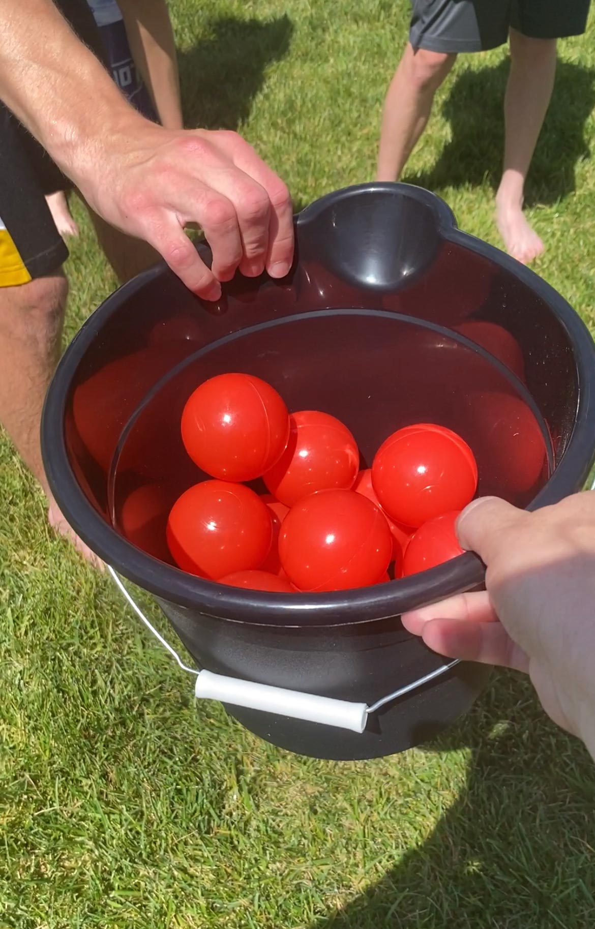 bucket filled with plastic balls