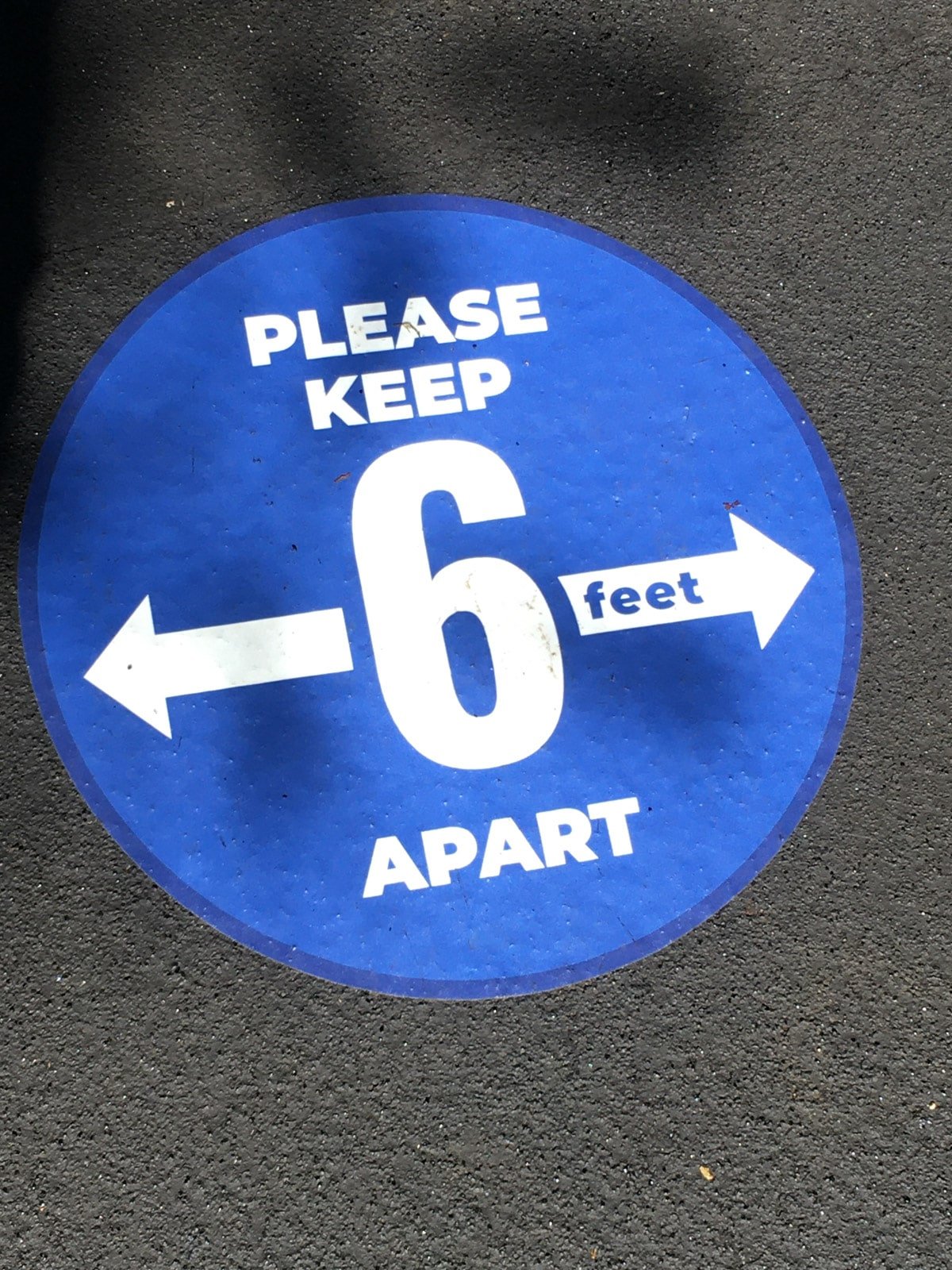 Six feet apart sticker at Silver Dollar City