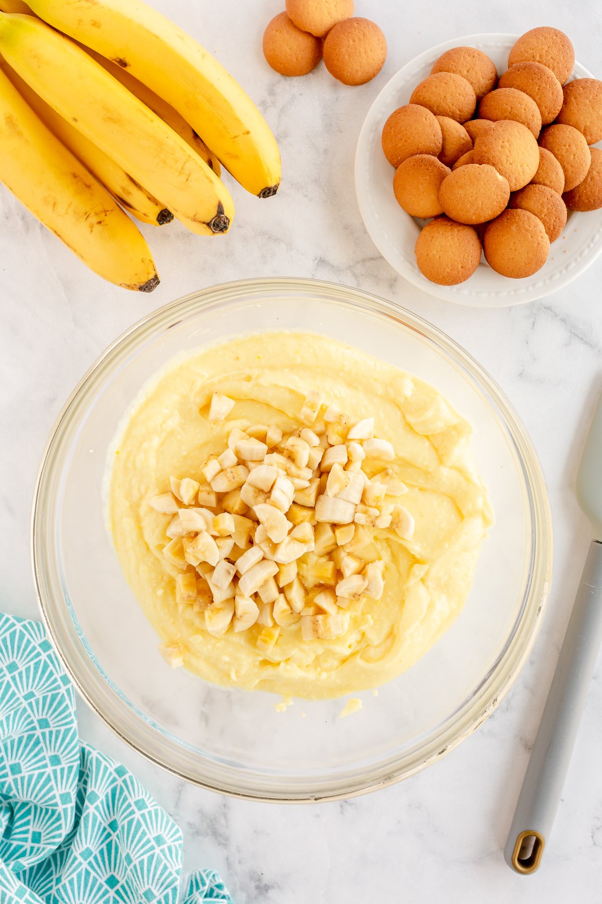 banana pudding cupcake filling in a glass bowl