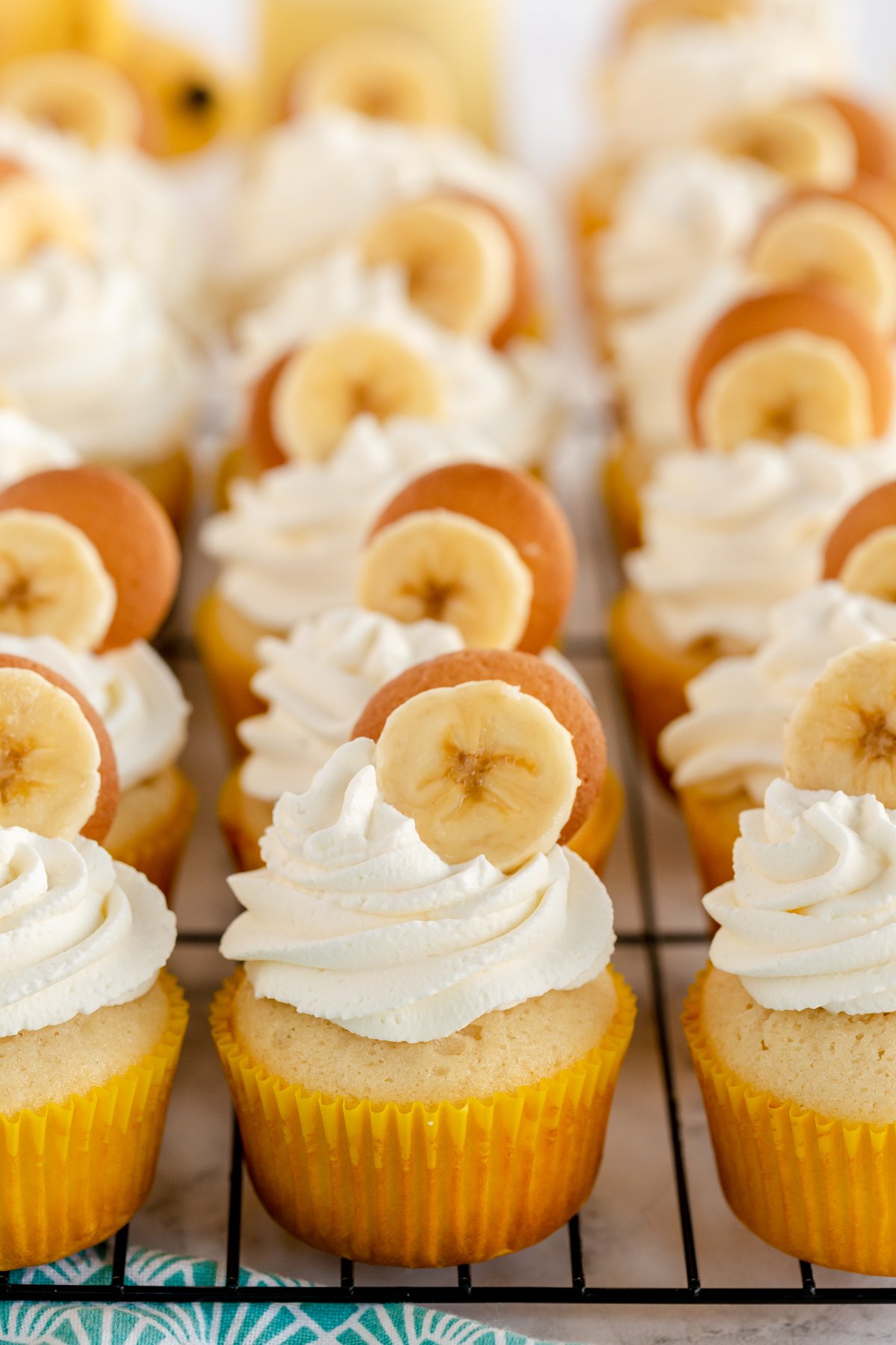 banana pudding cupcakes on a wire rack