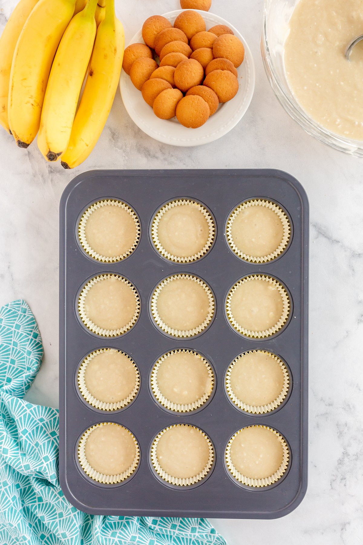 cupcake tin with banana pudding cupcake batter