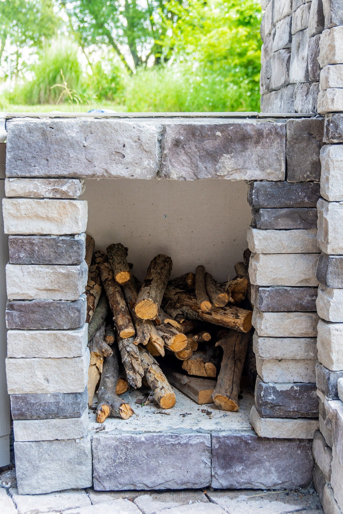 Stoned wood box for a backyard brick oven