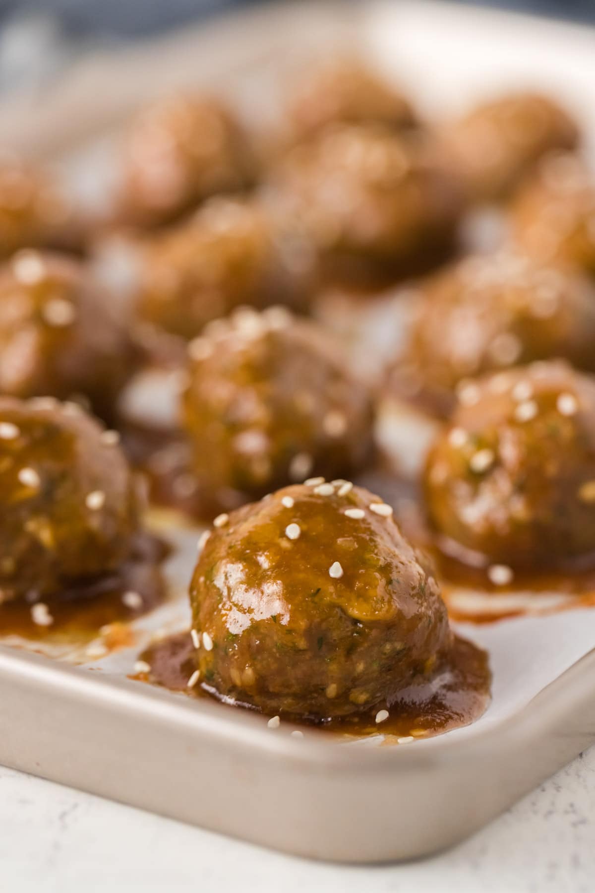 Teriyaki meatballs on a baking sheet