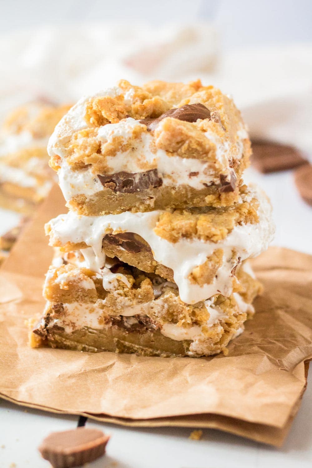 Close up shot of smore bars on a brown paper napkin