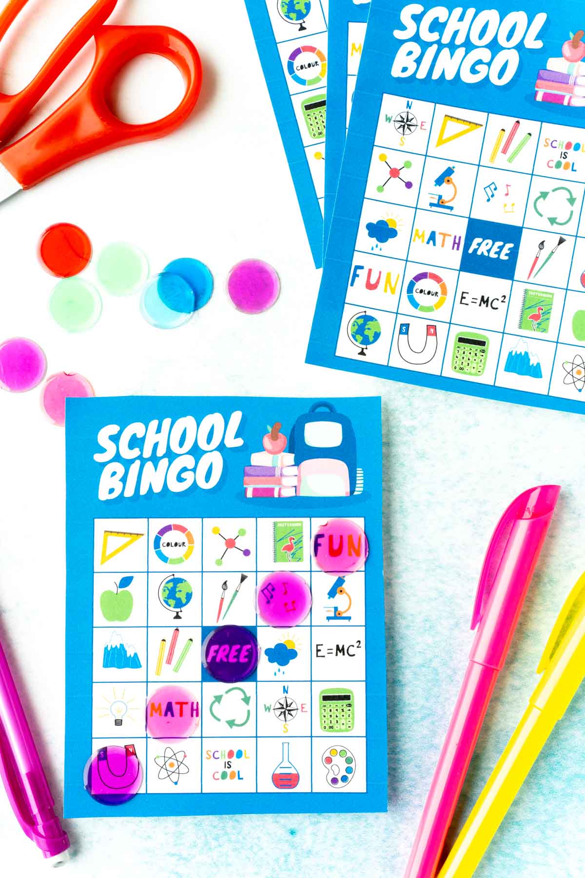 A blue school bingo card with school images on it