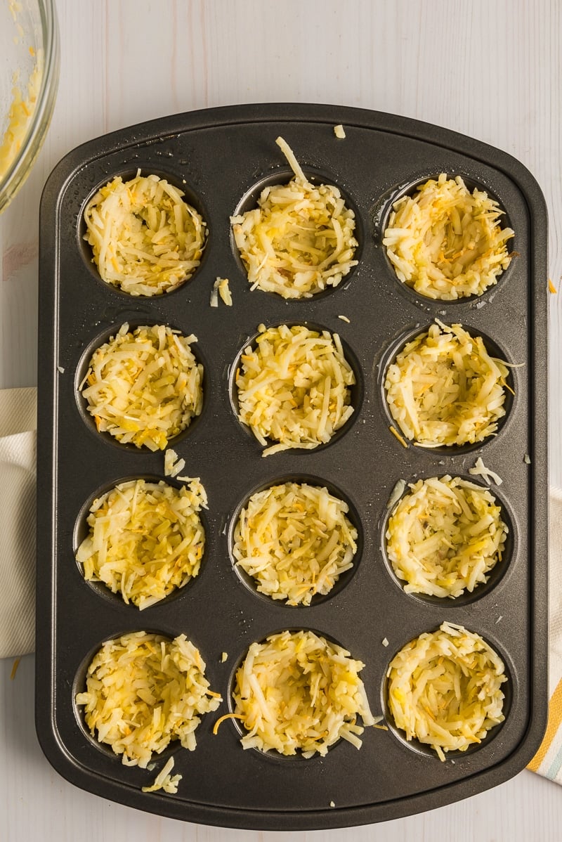 Hash brown mixture in muffin tins