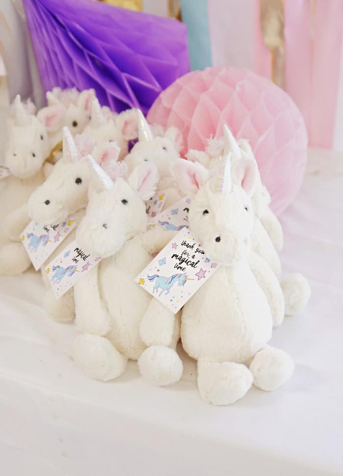 Plush unicorns with gift tags