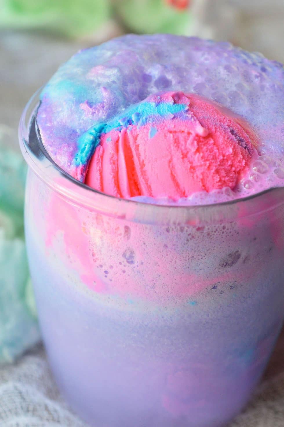 Colorful sherbet punch with pink and purple cotton candy