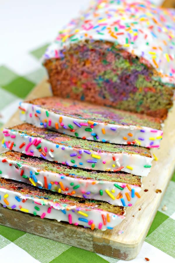 A sliced loaf of colorful bread with sprinkles
