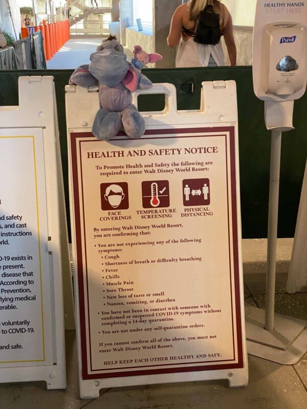 Sign with Eeyore and Piglet explaining health guidelines