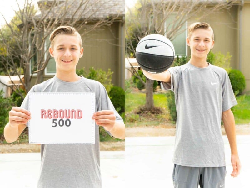 Boy in gray clothing holding a sign that says Rebound 500