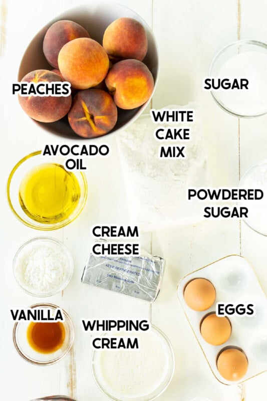 Fresh peaches, sugar, and other ingredients to make peach cake