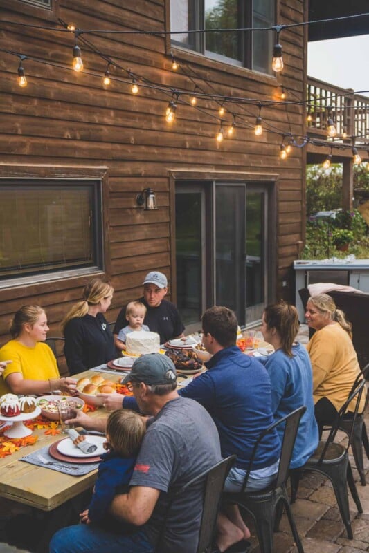 People talking to each other a long table