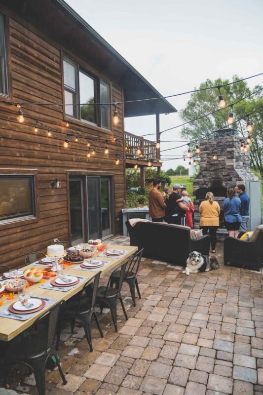 Lights strung in an outdoor entertaining area