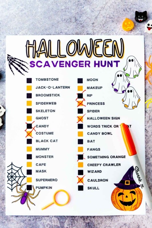 Printed out Halloween scavenger hunt with items checked off