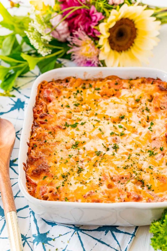 Baked ziti in a white rectangle baking dish