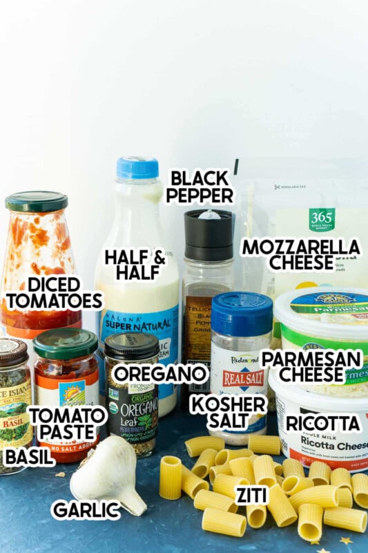 Ziti, garlic, and other spices in a stack with labels