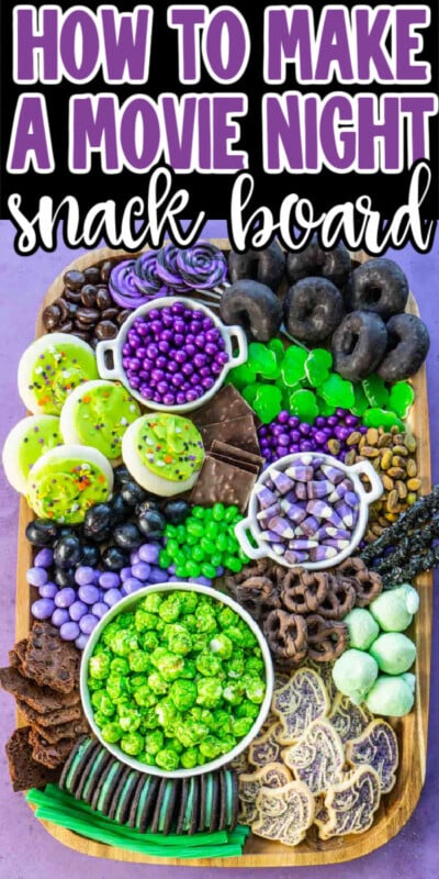 Wood board with lots of purple and green snacks and text for Pinterest