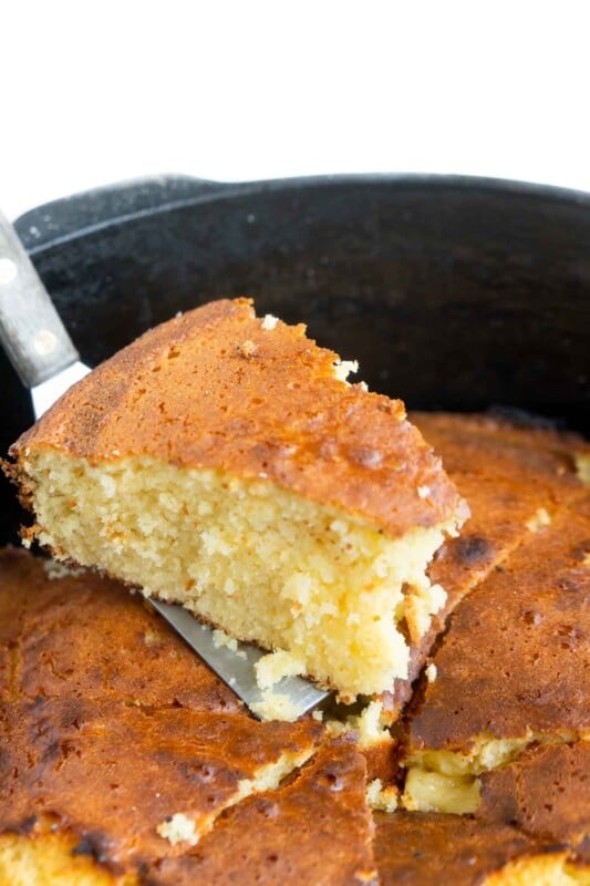 A spatula with a piece of cornbread