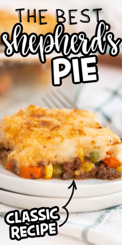 A white plate with a piece of easy shepherds pie on it