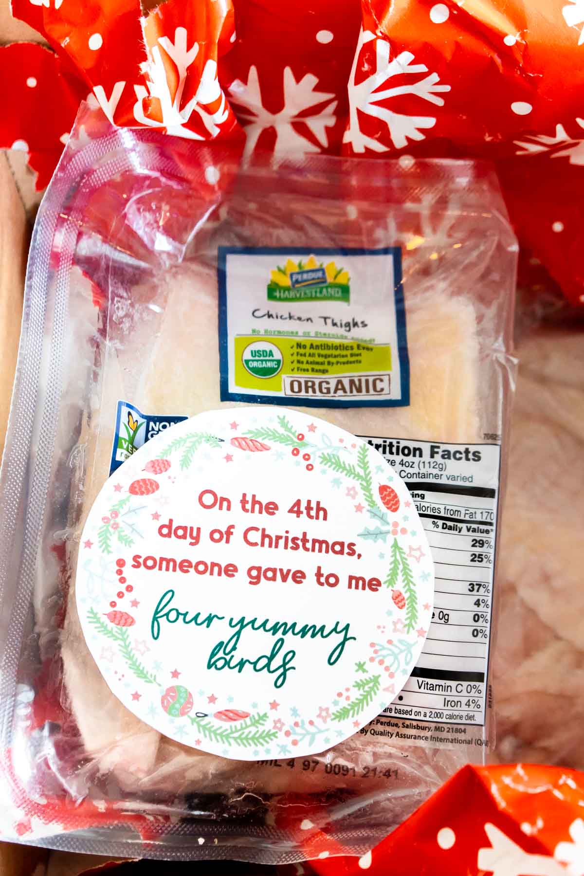 Frozen chicken with 12 days of christmas tags on top
