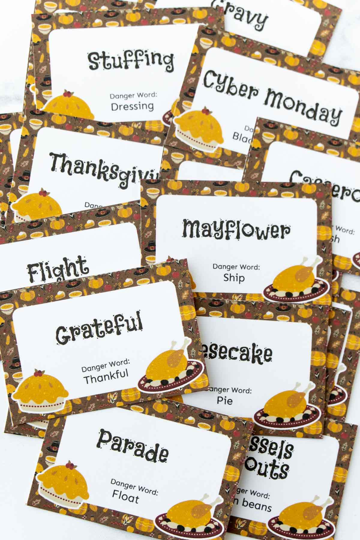 Thanksgiving danger word cards cut out and put in a pile