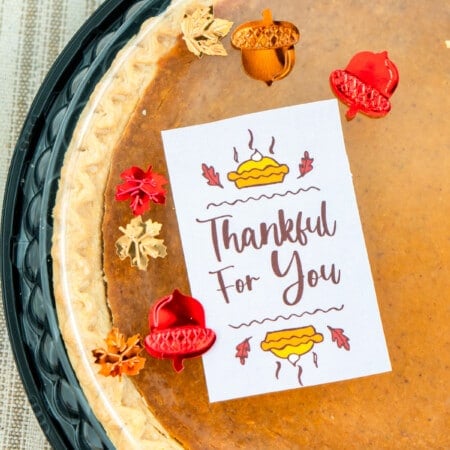 Thanksgiving gift tag on a pumpkin pie