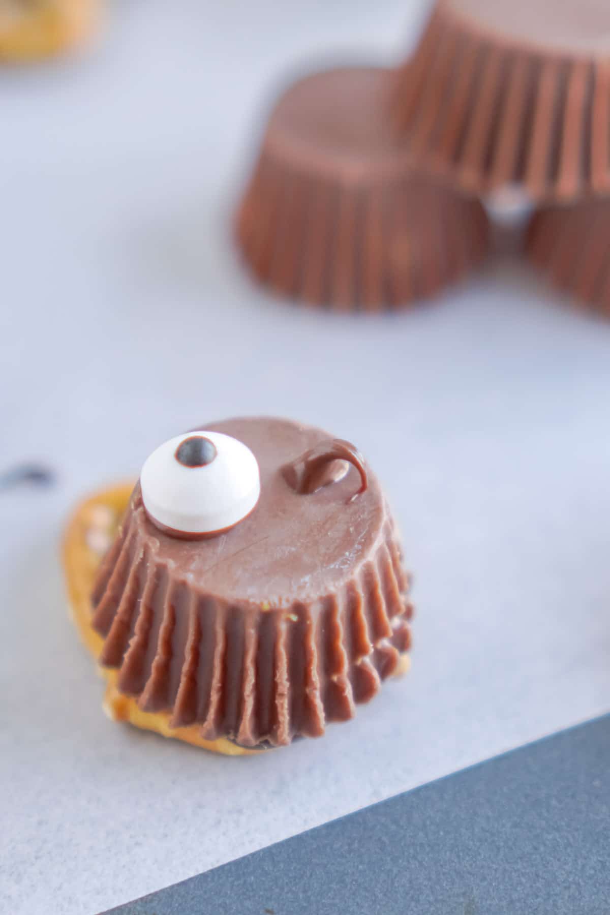Reese's Peanut Butter cup with candy eye on top