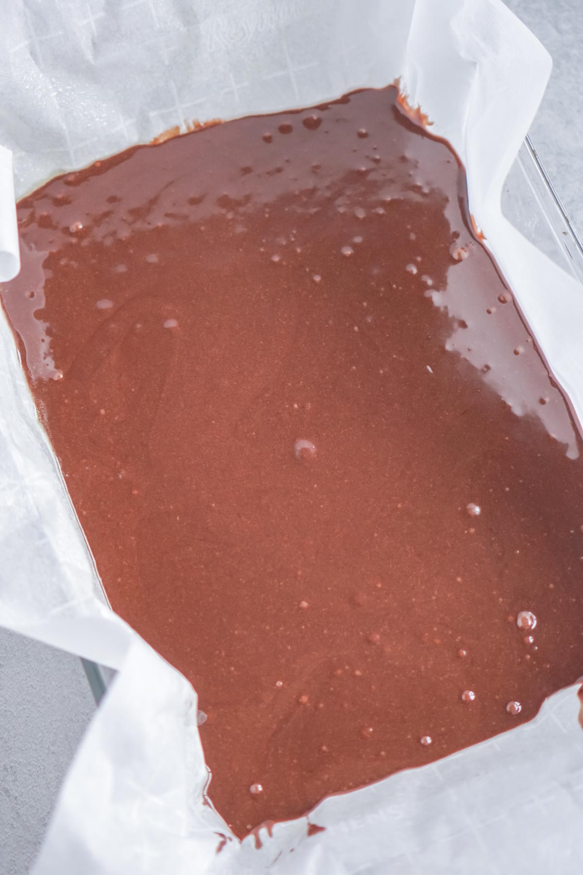 Brownie mix in a parchment paper lined pan