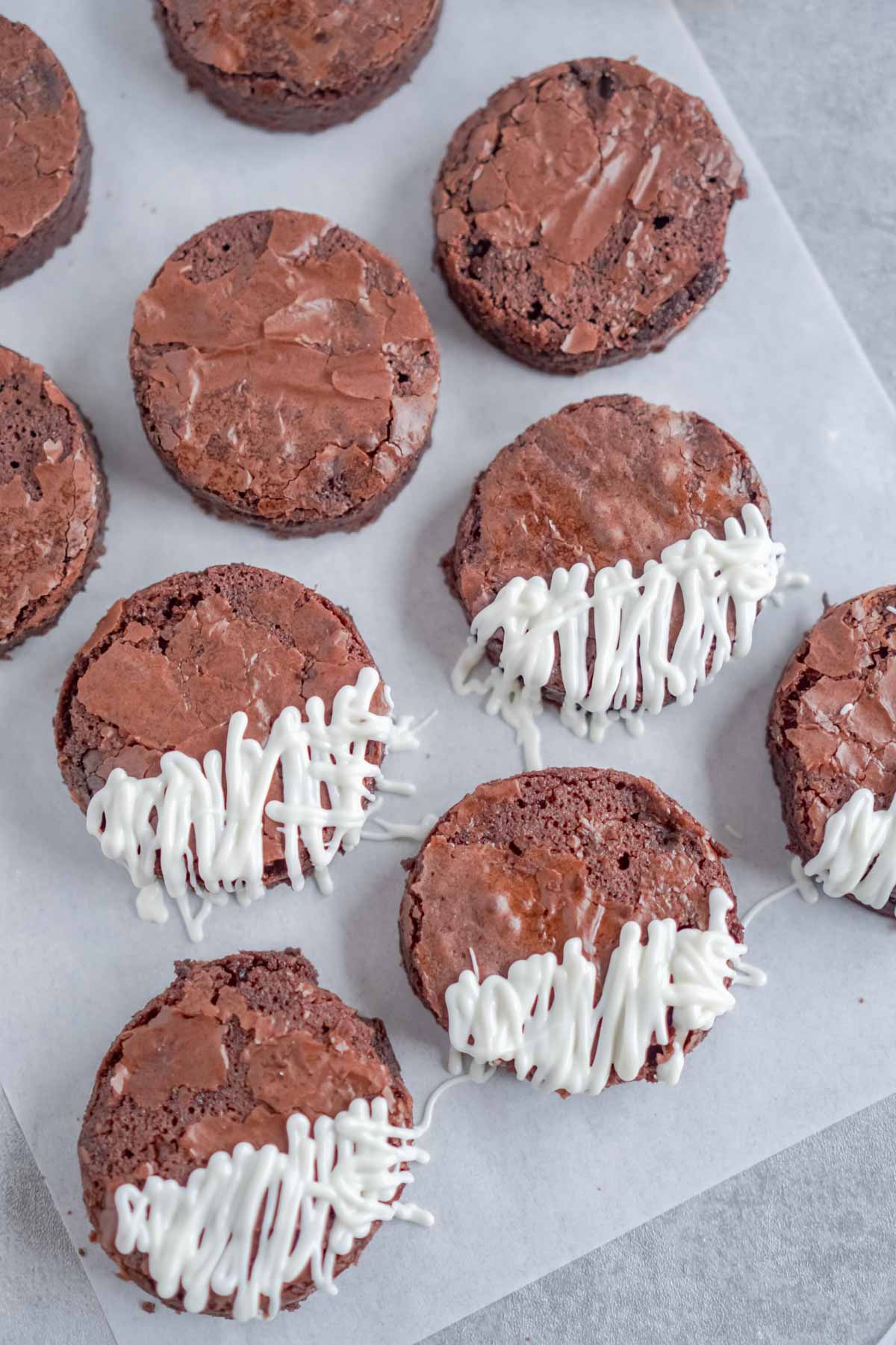Circle brownies with melted white chocolate snow