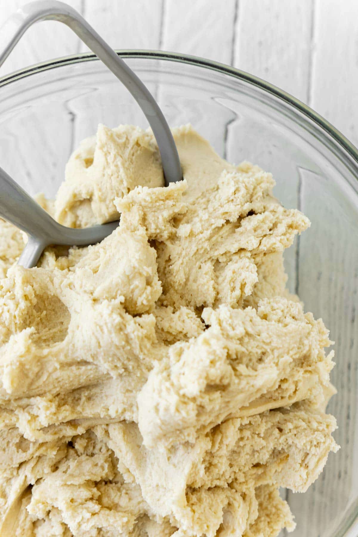 dough for orange sugar cookies in a mixing bowl