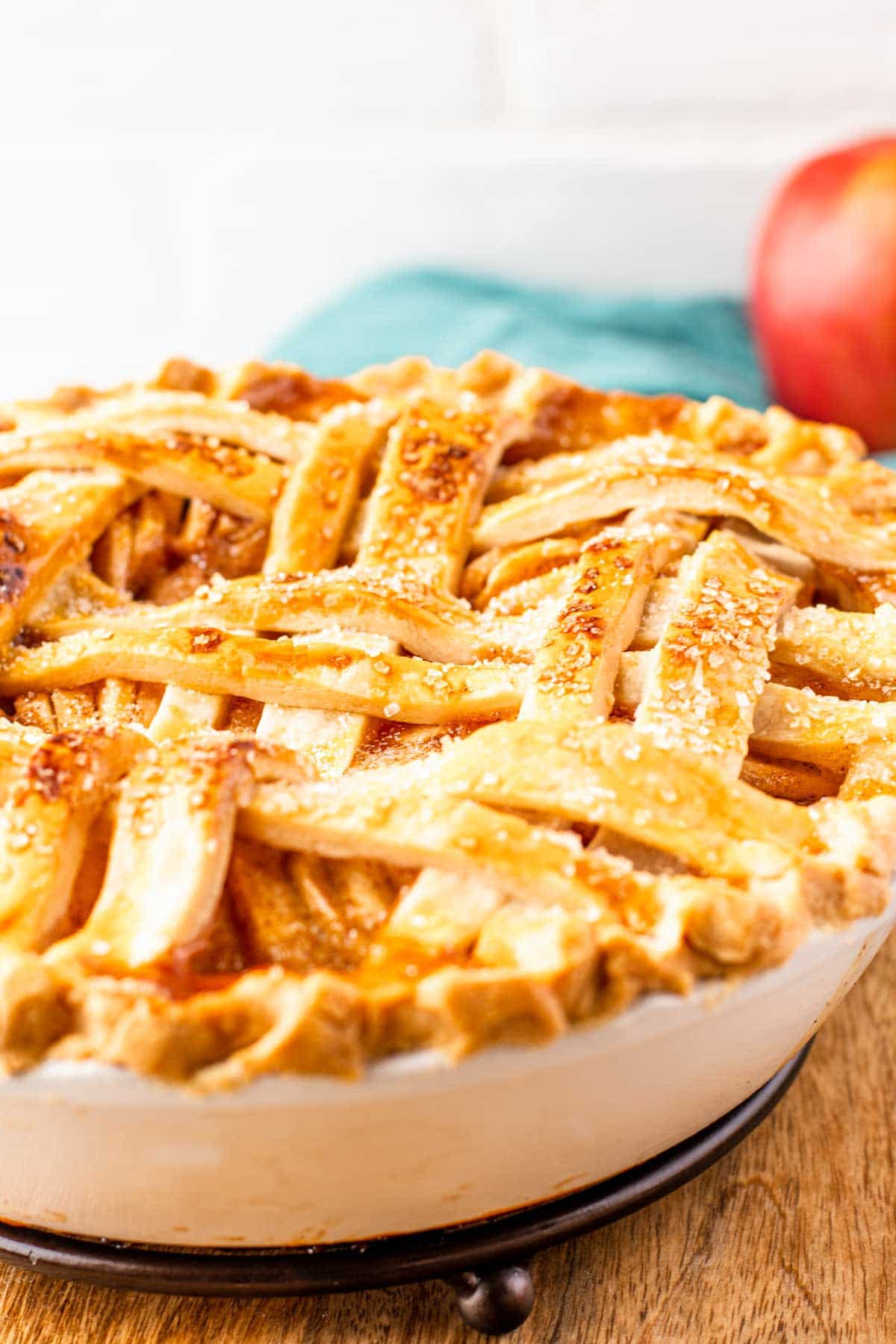 A pie with a basket weave flaky pie crust on top